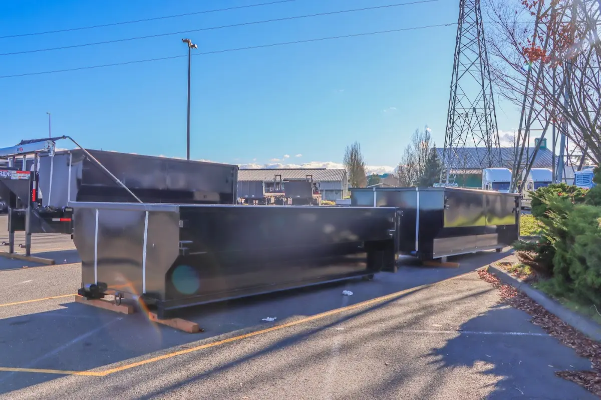 Roll-off dumpster ready for waste disposal at job site for 2 Yard Dumpster Rental in Newport